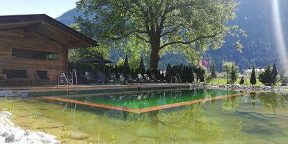 Pensionen - Art der Pension: Hotel Garni - Tiroler Unterland - Die Naturoase mit Naturbadeteich, Hüttensauna uvm. - Hotel Garni Birkenhof & Apartments Rosenhof