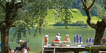 Pensionen - Ladestation Elektroauto - Österreich - Badestrand kinderfreundlich - Pension Bergblick am Weissensee