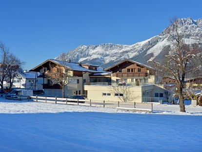 Pensionen - Radweg - Tirol - Unser Haus im Winter - Frühstückspension Appartements Steinbacher****